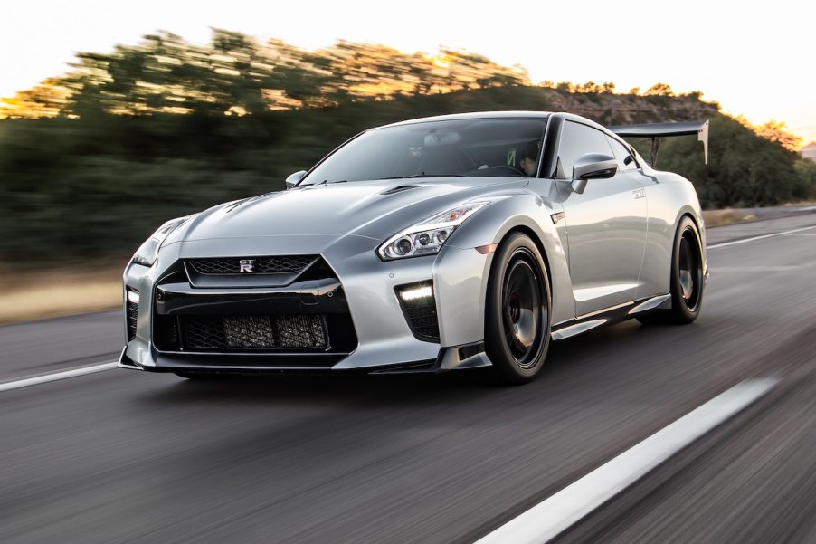 A Nissan GT-R driving down a road