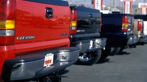 The back of some 2001 Chevy Silverado pickup trucks