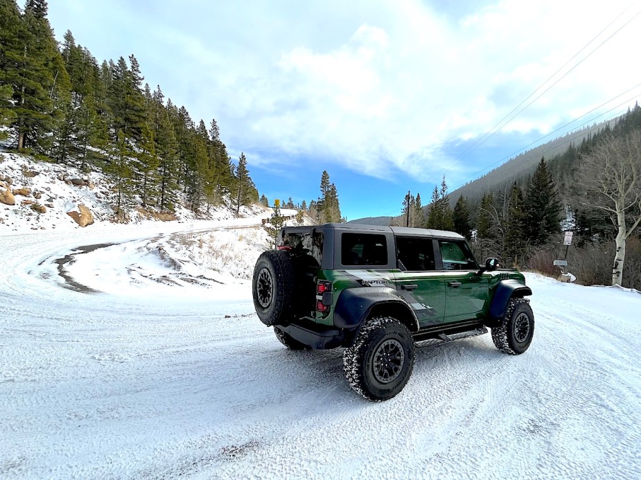 2022 Ford Bronco Raptor rear view in the snow, tips for heading into winter with only rear-wheel drive.