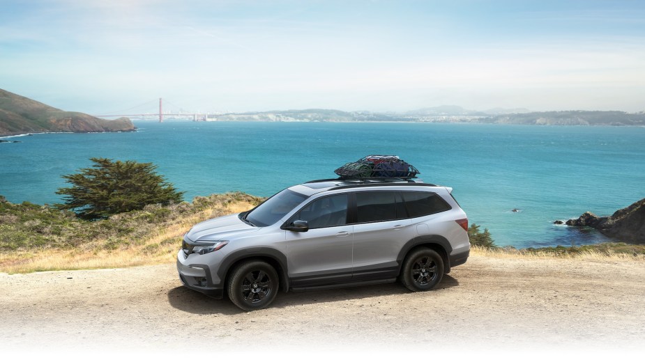 A 2022 honda pilot driving near a beach. It got a redesign for the new model year.