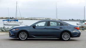 A 2022 Toyota Avalon Hybrid parked, the 2022 Toyota Avalon Hybrid is one of the best hybrid cars for families