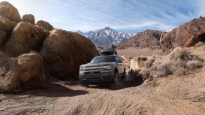 A 2022 ford bronco sport badlands doing some off-roading outdoors.