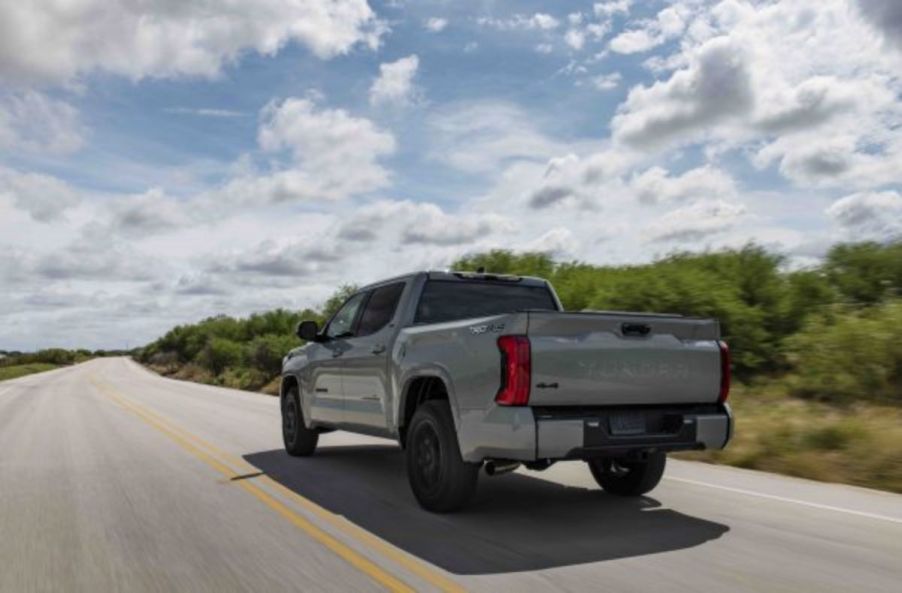 A 2022 Toyota Tundra driving down an open road.