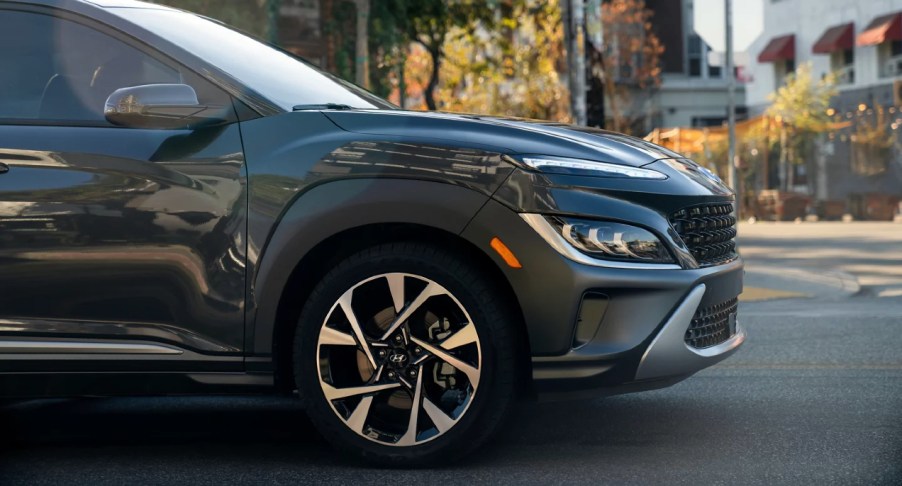 A black 2023 Hyundai Kona subcompact SUV is parked.