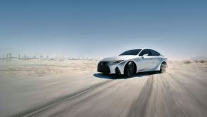 A 2023 Lexus IS 350 F Sport compact executive car in Iridium picture in a desert landscape