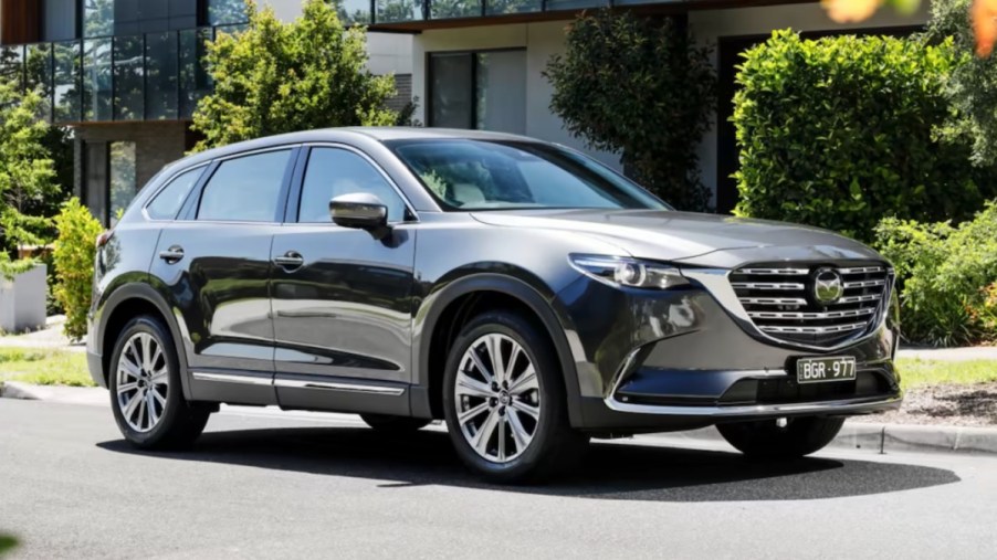 Gray 2023 Mazda CX-90 Three-Row SUV Parked on a Street