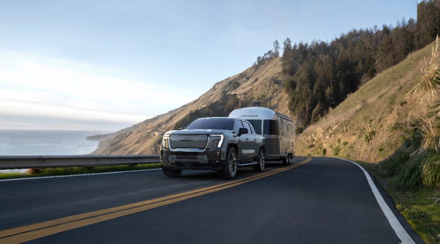 Front view of the 2024 GMC Sierra EV Denali Edition 1 trailering.