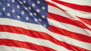 Closeup of the United States flag flying in the breeze.