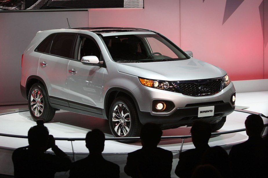 A silver 2009 Kia Sorento on display ate an auto show. 