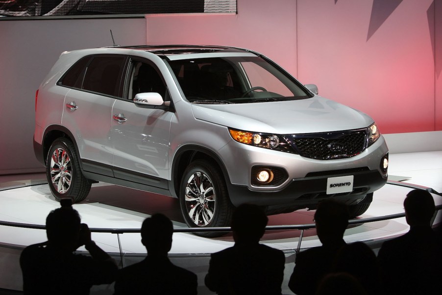 A silver 2009 Kia Sorento on display ate an auto show.