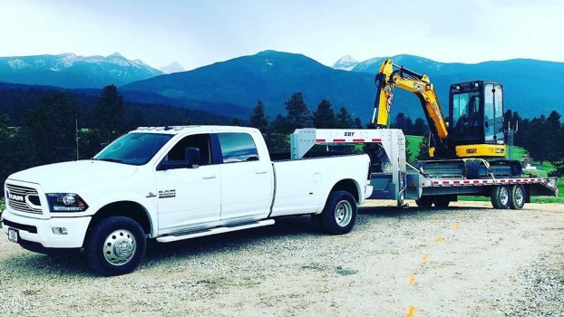 Why Do Some Pickup Trucks Have a Trailer Hitch in the Center of Their Bed?