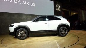 A white Mazda MX-30 electric SUV.