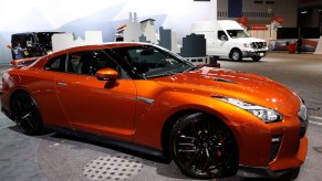 Nissan GTR in orange at an auto show