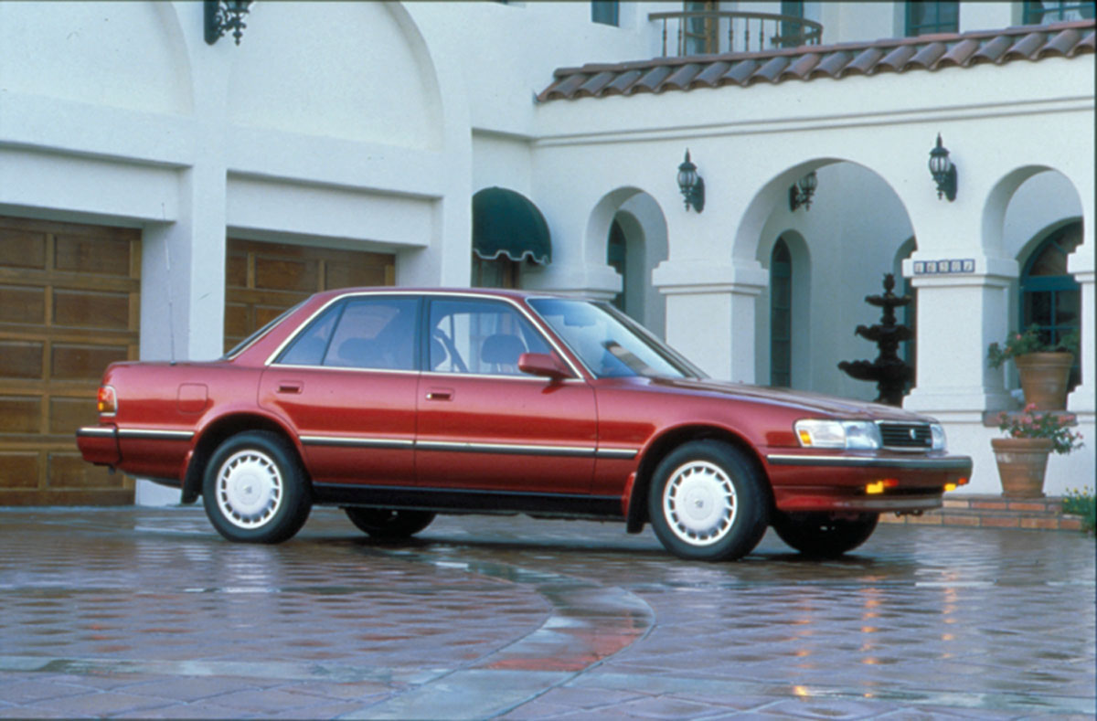 A red Toyota Cressida model parked 