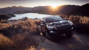 A Toyota Land Cruiser SUV driving up a hill, the Land Cruiser is the most reliable SUV according to iSeeCars' data