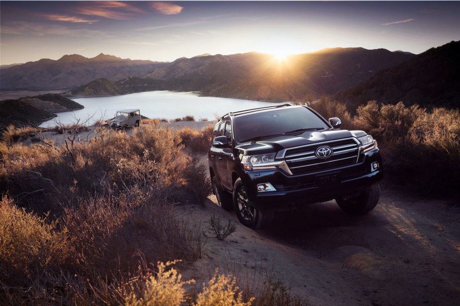 A Toyota Land Cruiser SUV driving up a hill, the Land Cruiser is the most reliable SUV according to iSeeCars' data