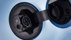 A charge outlet of a Toyota Prius Prime plug-in hybrid electric vehicle (PHEV) model