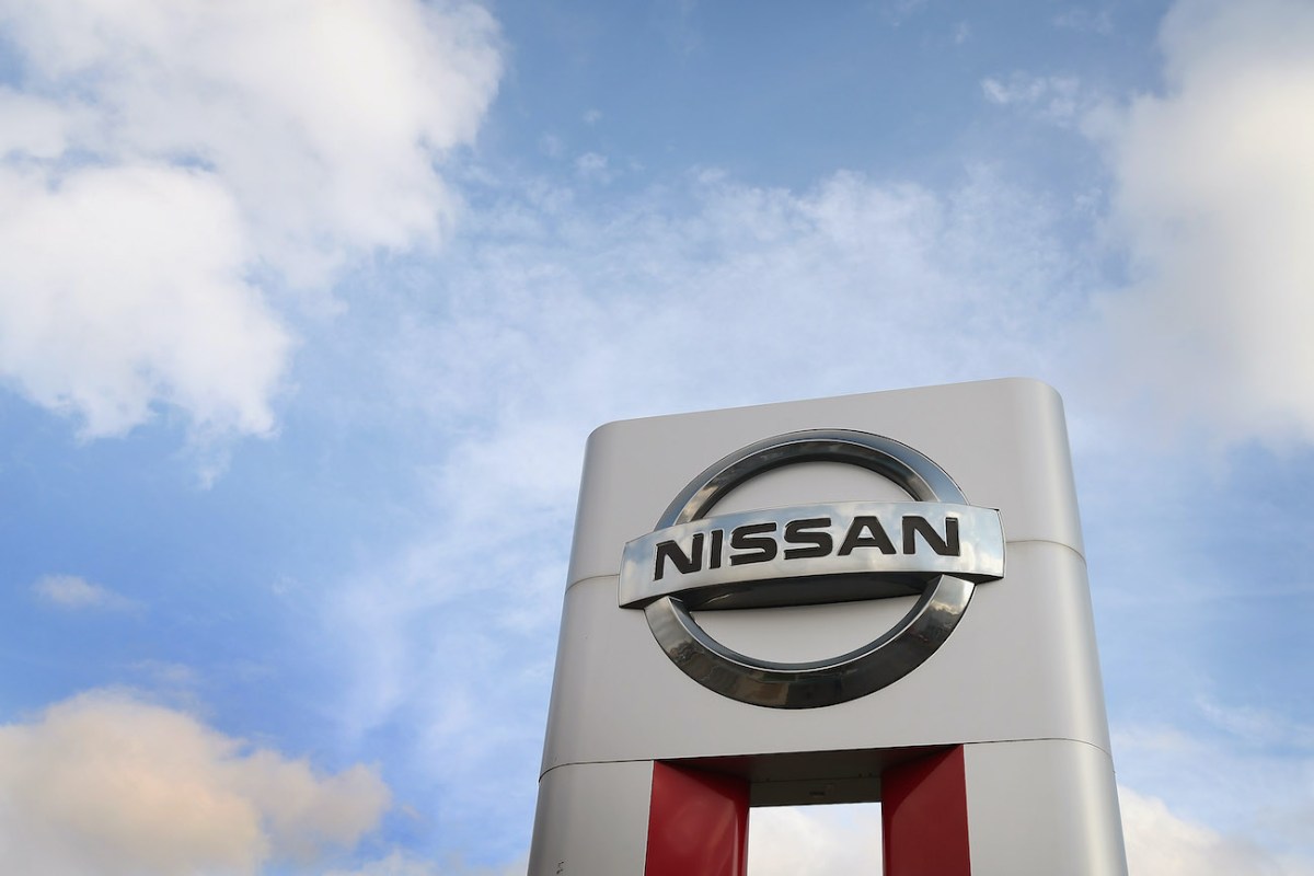 A Nissan sign outside of a dealership