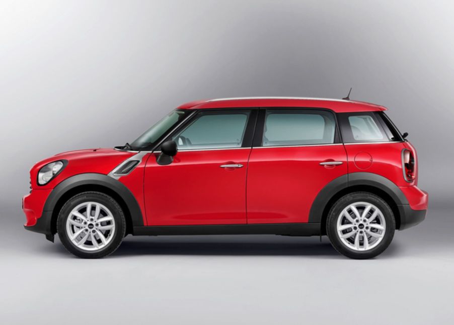 A red 2013 Mini Cooper Countryman subcompact luxury crossover SUV model