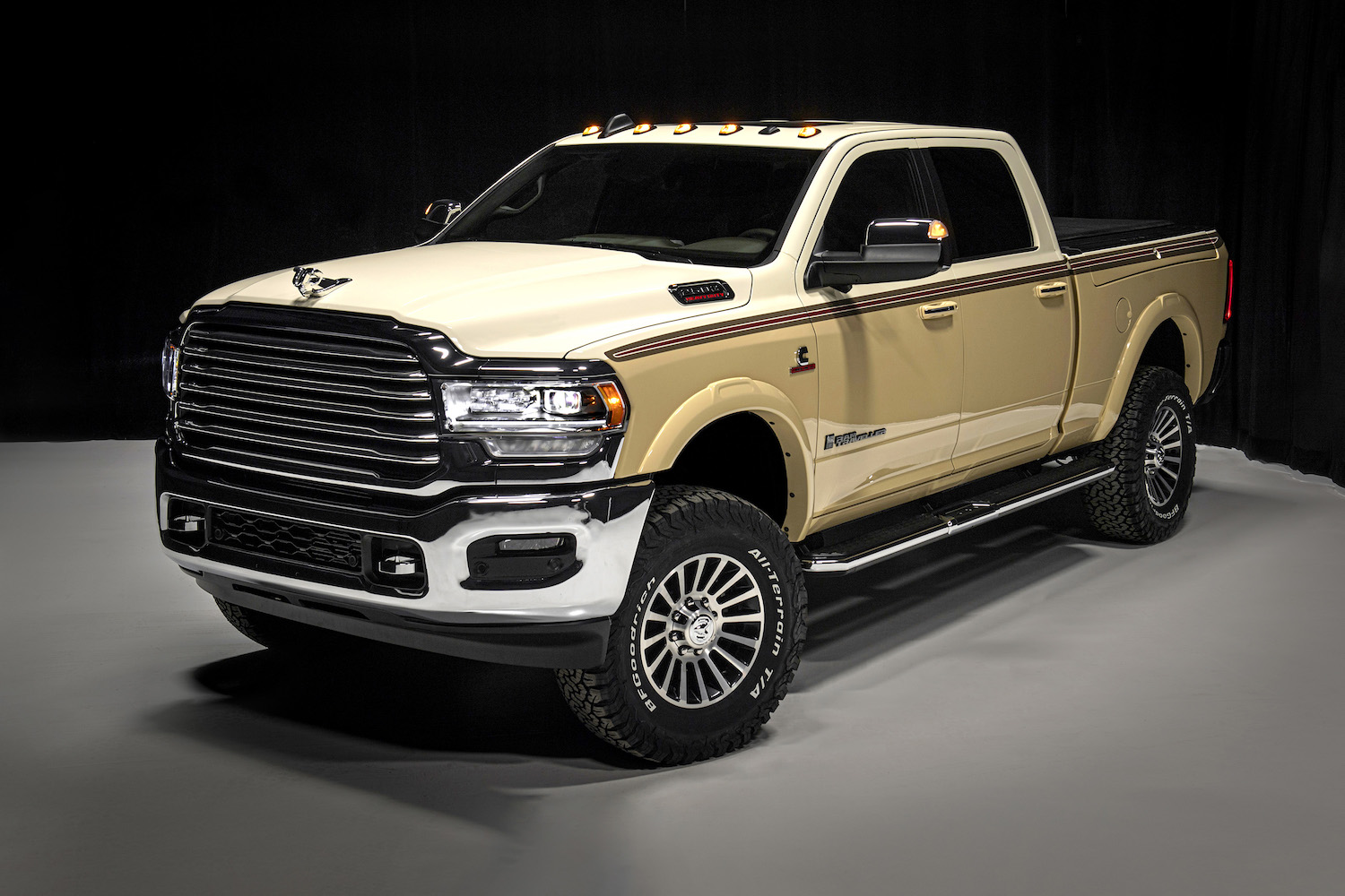 Promo photo of Chris Stapleton's custom cream-colored Ram 2500 pickup truck based on the 1979 Dodge Palomino, parked in front of a black background.