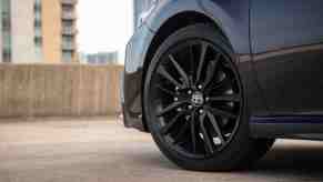 The wheel of a 2022 Toyota Camry, which is one of the best new midsize car under $30,000.