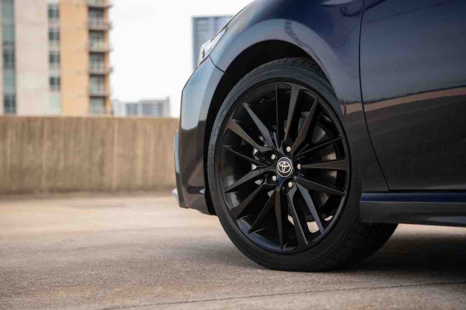 The wheel of a 2022 Toyota Camry, which is one of the best new midsize car under $30,000. 