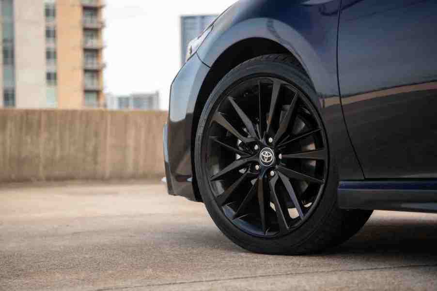 The wheel of a 2022 Toyota Camry, which is one of the best new midsize car under $30,000.