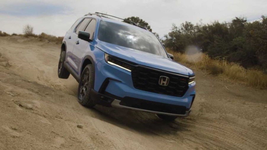 2023 Honda Pilot TrailSport Riding Down a Trail