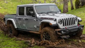 2023 Jeep Gladiator driving through the mud