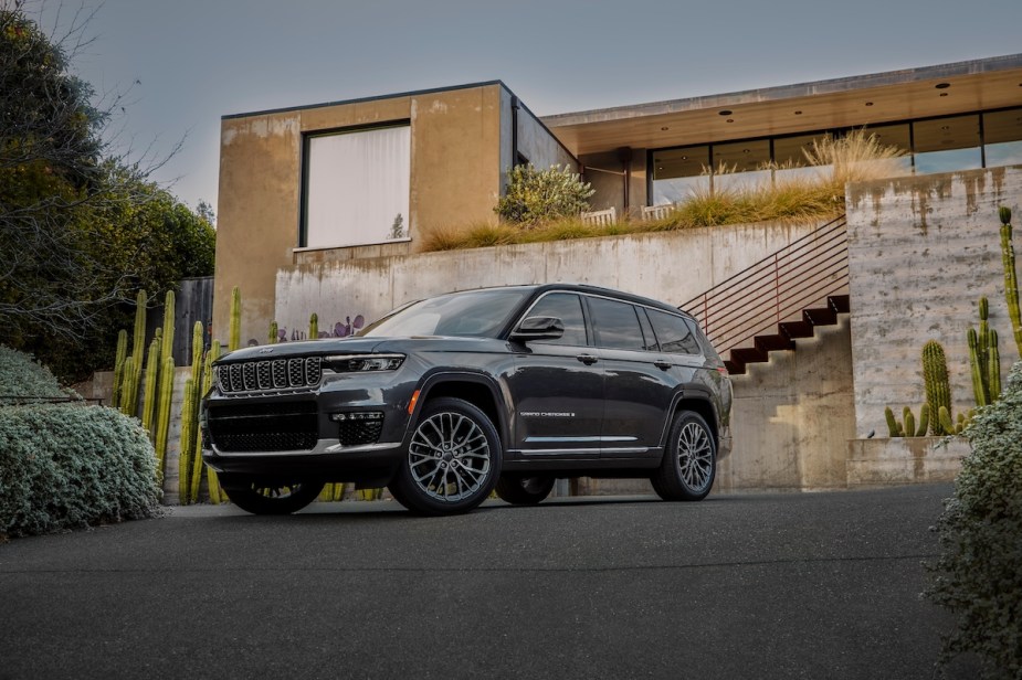 A gray 2023 Jeep Grand Cherokee L, one of the best mid-size third-row SUVs. 