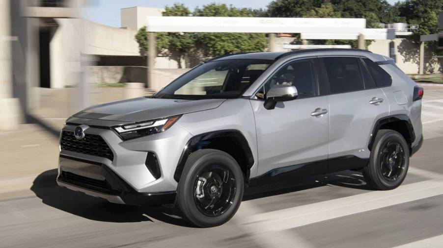 The 2023 Toyota RAV4 driving down the street