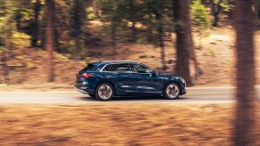 A 2023 Audi e-tron driving outside, one of the best electric SUVs for driving in snow.