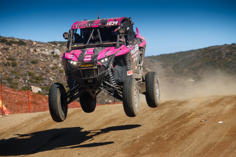 Kristin Matlock's car going over a jump.