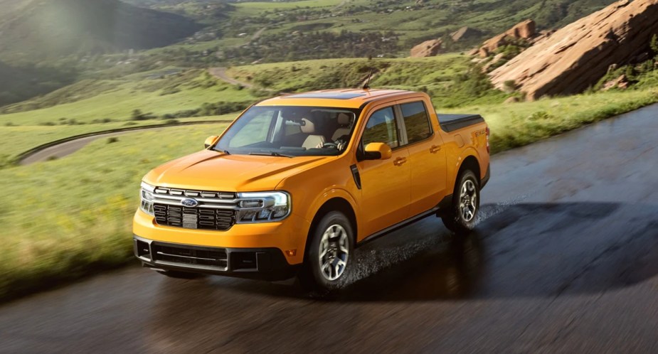 A yellow 2023 Ford Maverick small pickup truck. 