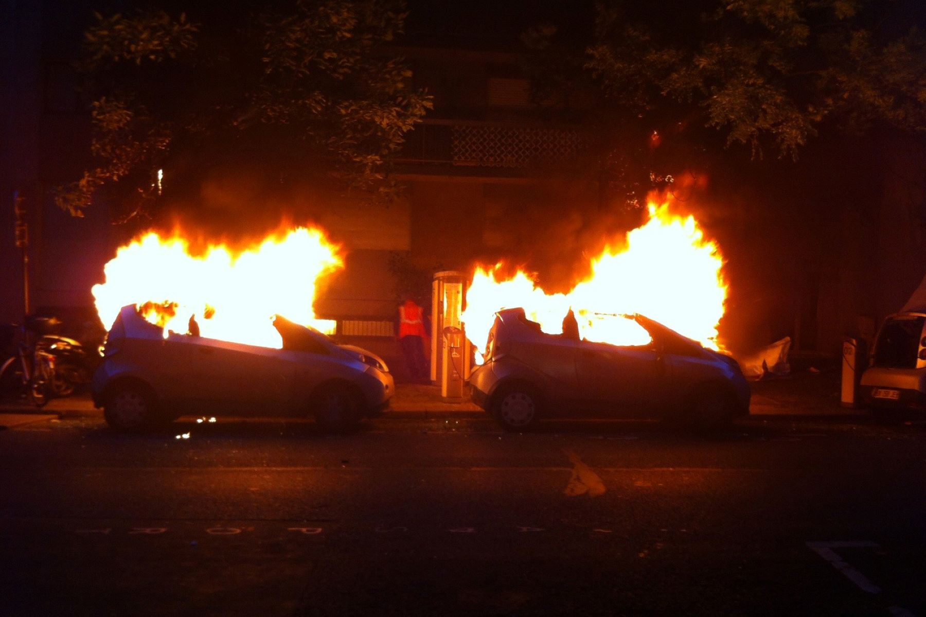 French Autolib electric pick-up service cars on fire on a Paris street