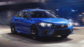 Front angle view of blue 2023 Honda Civic compact car