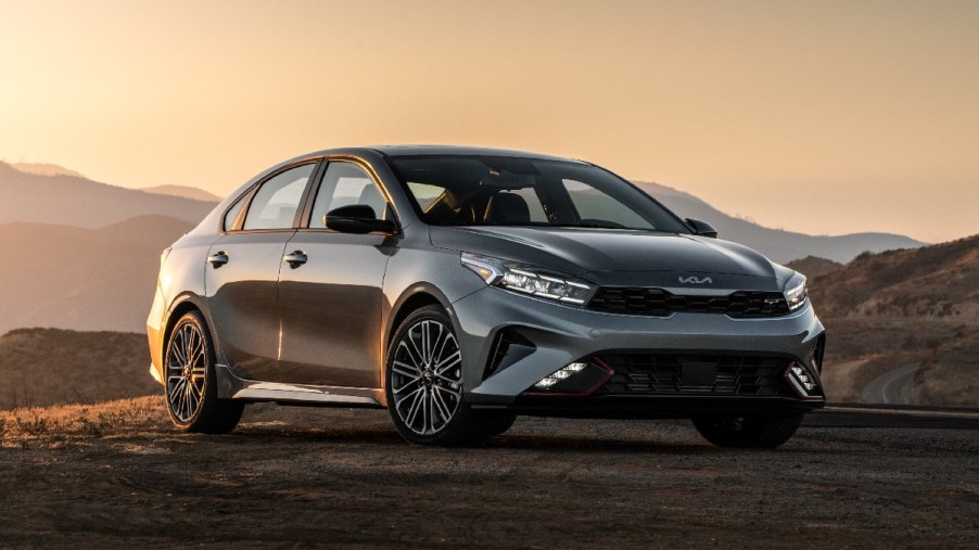 Front angle view of gray 2022 Kia Forte, which costs under $20,000 and is one of the most comfortable cars