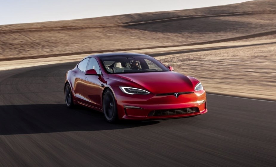 Front angle view of red 2023 Tesla Model S, only Tesla electric car with driving range over 400 miles