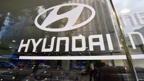 The Hyundai logo and print on glass at a company branch in Seoul, South Korea