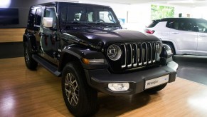 A black Jeep Wrangler, potentially one of the Jeep Wrangler prices that skyrocketed.