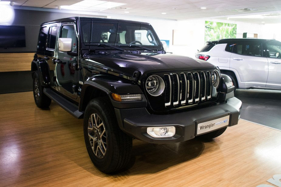 A black Jeep Wrangler, potentially one of the Jeep Wrangler prices that skyrocketed. 