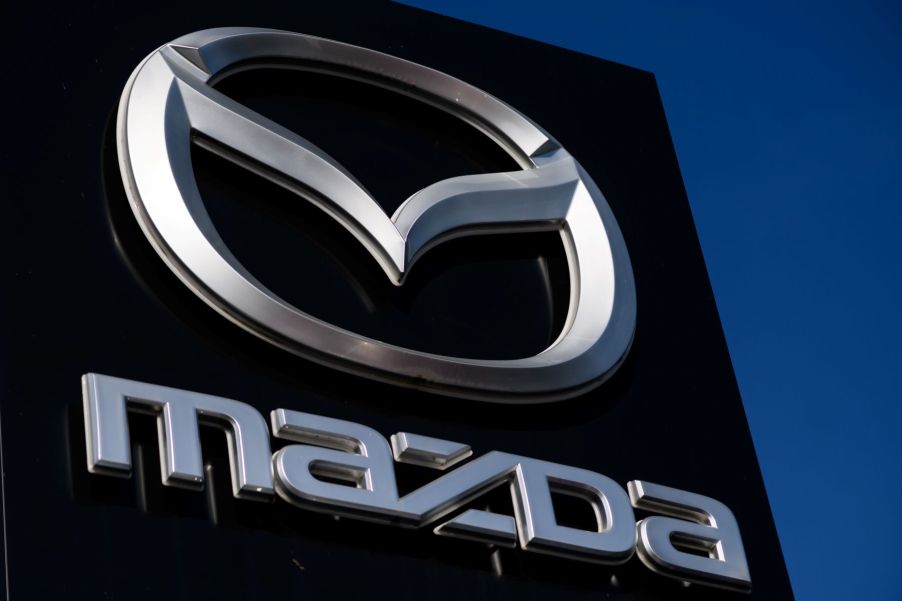 The Mazda logo pictured on outdoor advertising in Dortmund, Germany