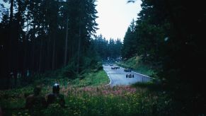 Cars racing around the track at Nürburgring.