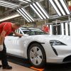 A vehicle fit-and-finish and reliability inspection of a Porsche Taycan electric sports car in Stuttgart, Germany