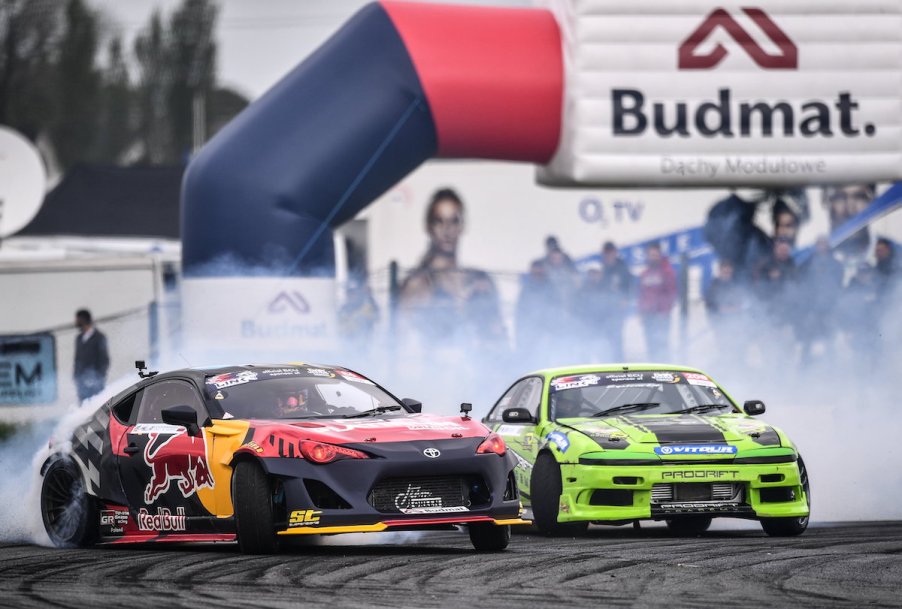 A red and green S14 Silvia racing down the track.