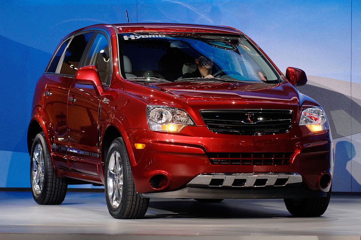 A red Saturn Vue on display at an auto show