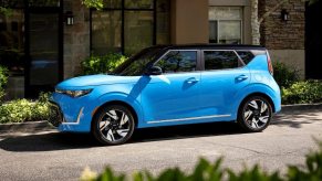 Side view of blue 2023 Kia Soul, the only SUV recommended by Consumer Reports that costs under $20,000