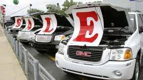 Car lot announcing a sale. The best sales to buy a new car happen right before New Year's.