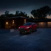 Comfortable and reliable SUVs under $45,000 like the Toyota Venza, one of the best midsize SUVs for 2023, pictured here in red.