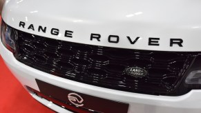 The Range Rover logo on a white Range Rover.